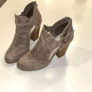 Fergie boots. Back zip. Cut out design. Size 8. Like new.